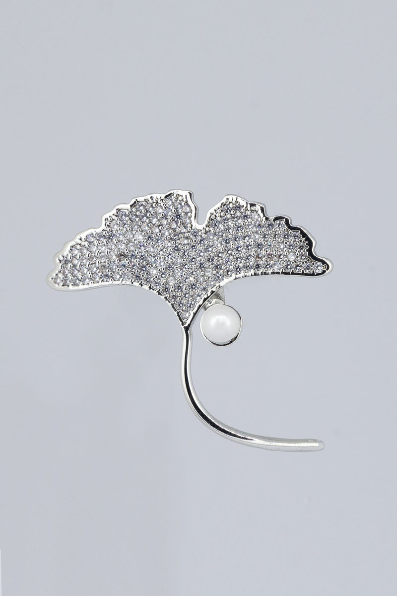 SILVER DOLLY BROOCH