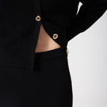 Black Ribbed Mid-Length Knit Skirt with Slit